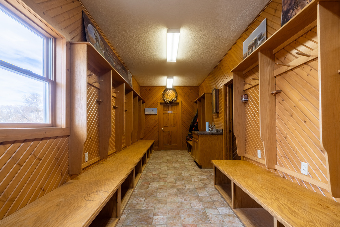 The lodge mud room lined with wooden lockers